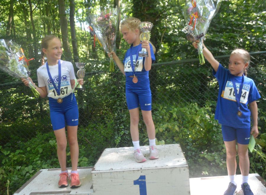 Compleet DEM podium bij pupillen bij Marquetteloop